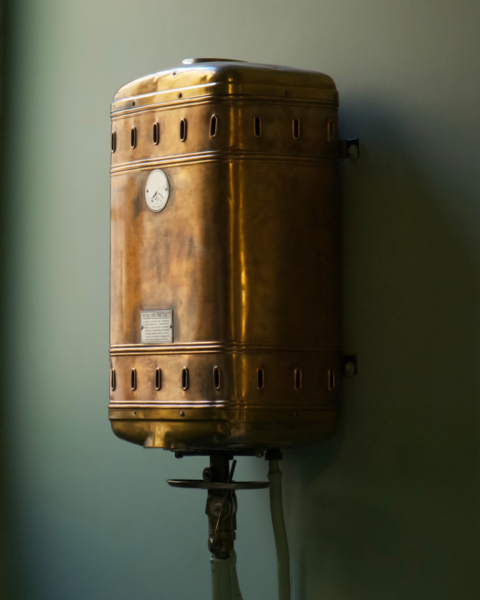 brown steel container on white wall